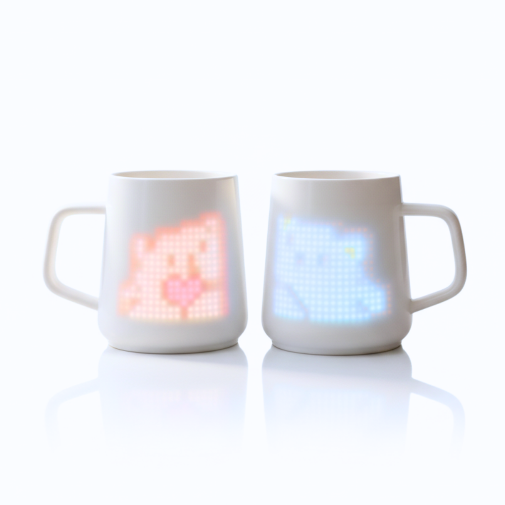 PixelMug twin pack featuring two white smart LED mugs side by side on a white background. Perfect matching couple gift set for long-distance relationships and anniversaries.