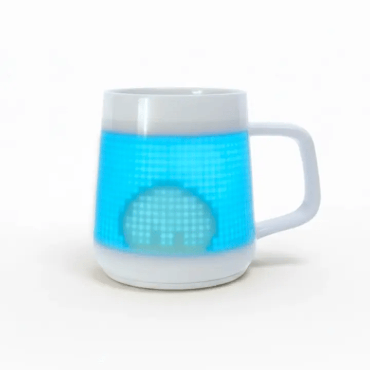 PixelMug ceramic mug displaying animated blue slime jumping pixel art on white background